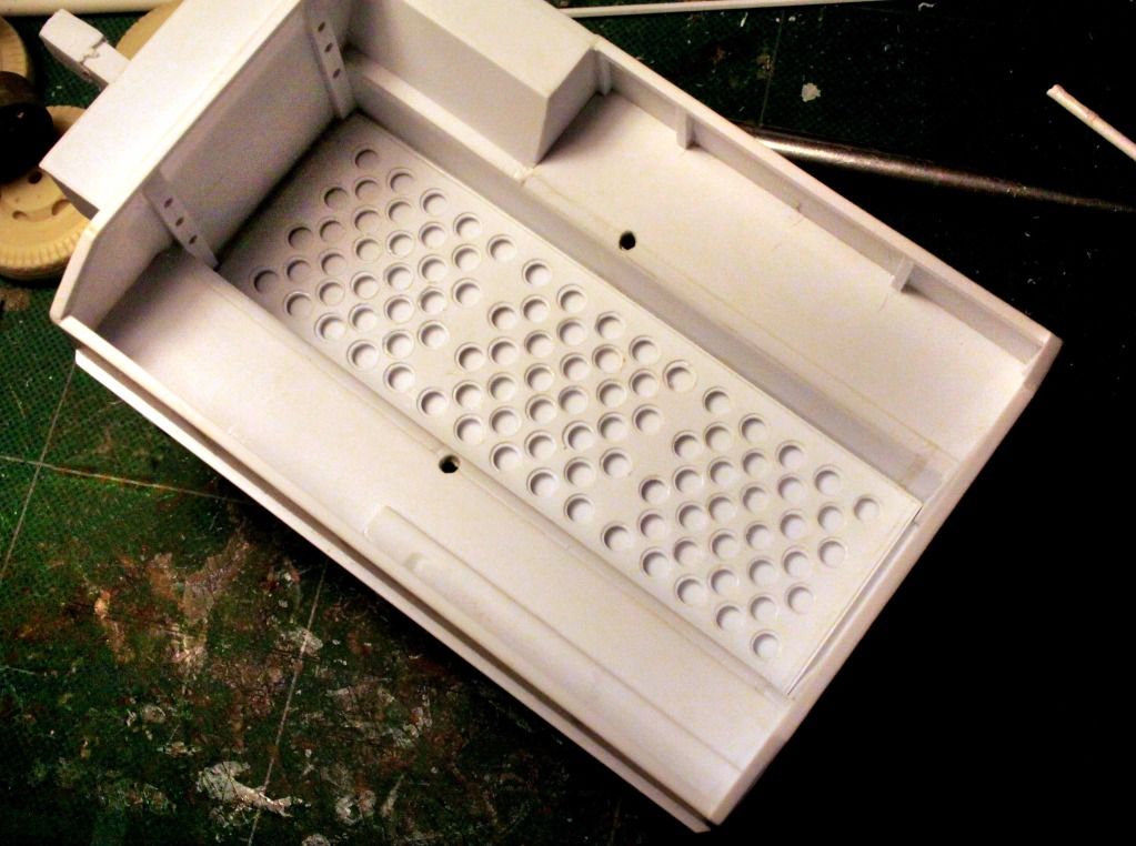 The interior ammo base plate partially completed